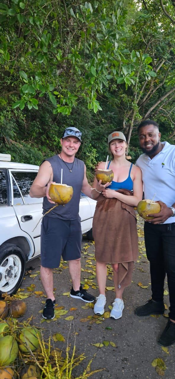 Noel's team with clients at Sangster Airport Montego Bay — airport transfer service